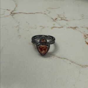 Exquisite Women's Ring with Orange Gemstone and Silver Band